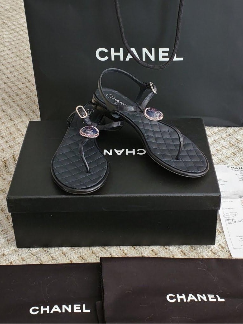 CHANEL Black Quilted Leather Thong Sandals with Logo Medallion